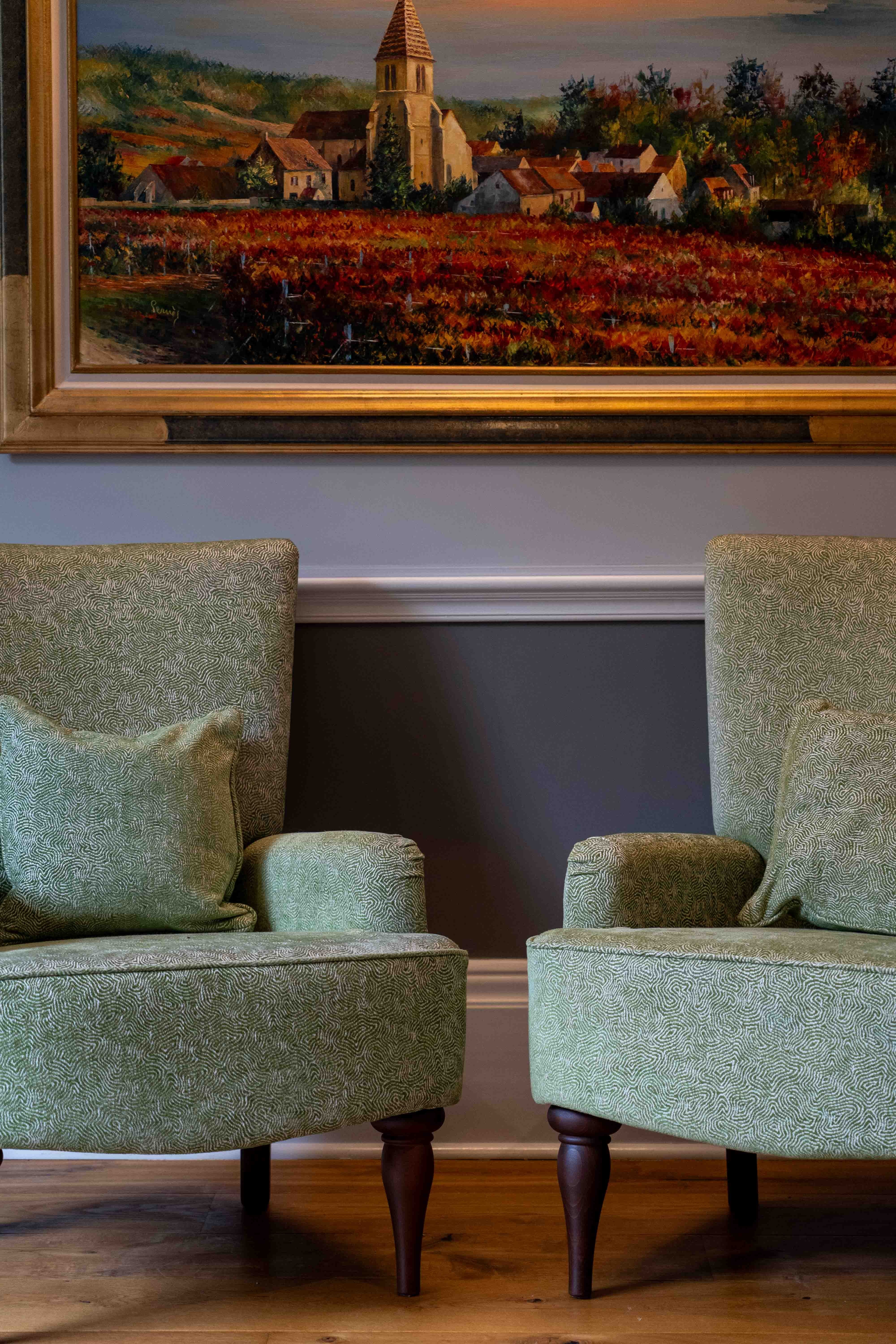 A pair of Wesley Barrell armchairs, width 77cm, depth 60cm, height 98cm. Condition - good
